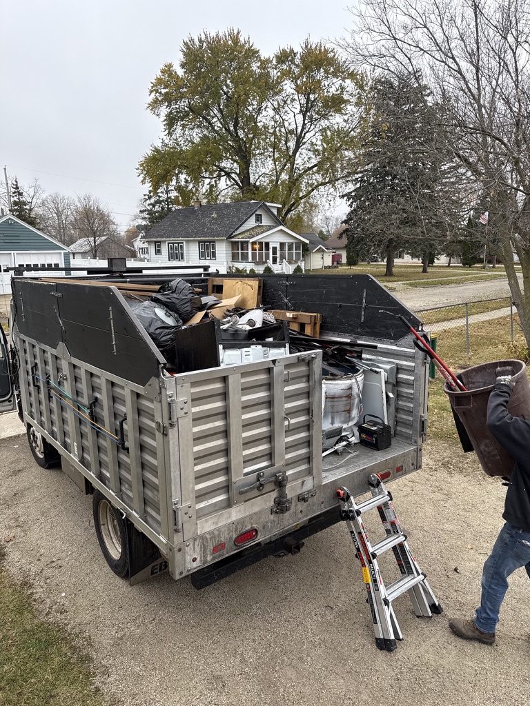 Clear The Clutter junk removal truck fully loaded - highest capacity for full load pricing