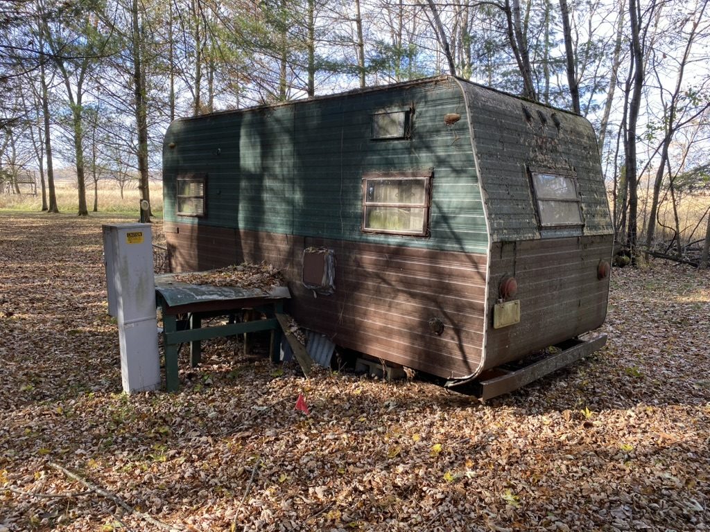 Old camper removal from rural property in Wisconsin